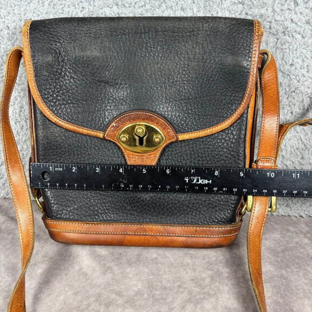 Dooney & Bourke Crossbody Bag Womens Medium Black Tan All Weather Leather Toggle